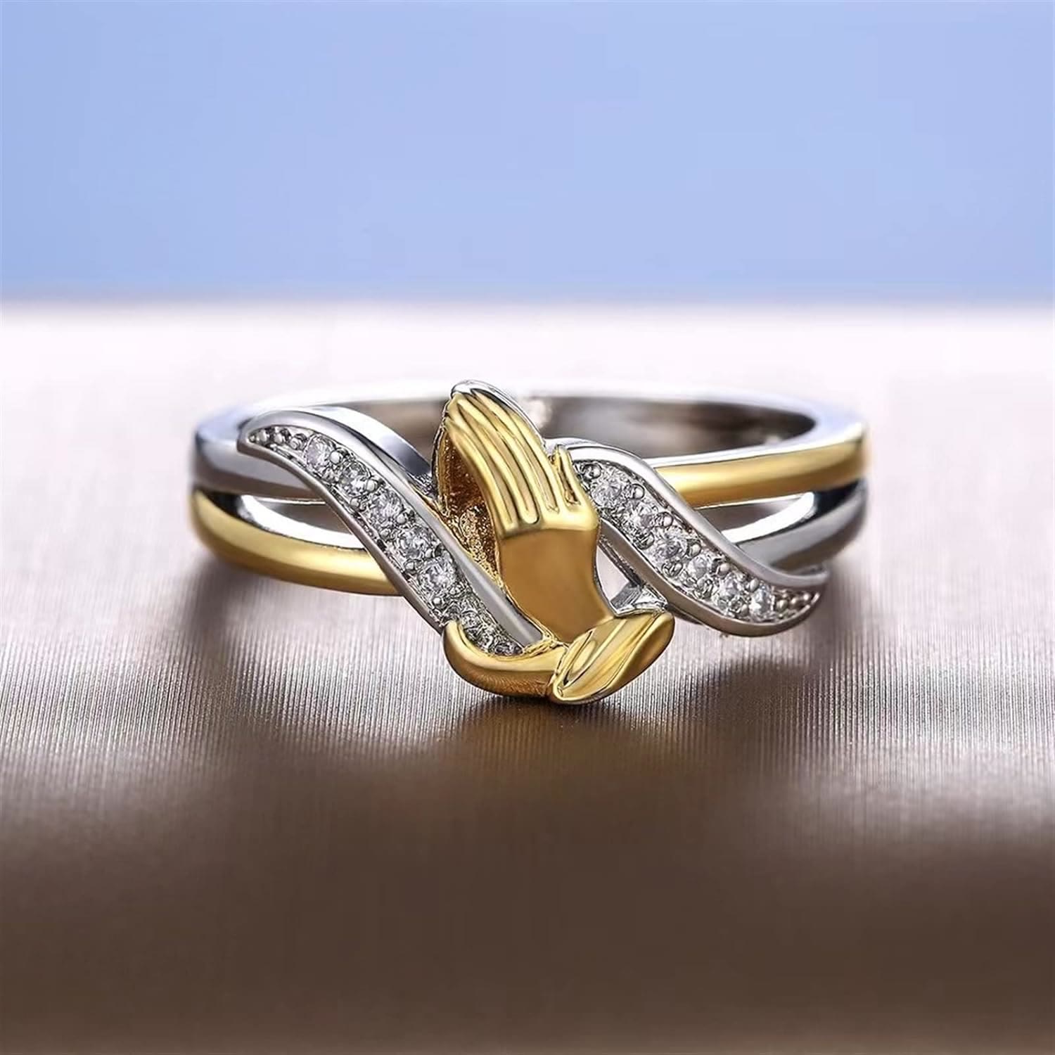 Anillo de Manos Orando en Oro y Plata