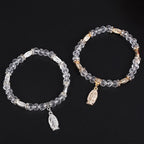 Pulsera de Cuentas de Cristal Transparente con Dije de la Virgen María