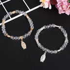 Pulsera de Cuentas de Cristal Transparente con Dije de la Virgen María