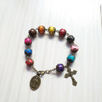 Pulsera de Madera en Colores Antiguos con San Benito y Crucifijo