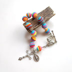 Pulsera Religiosa de Cuentas Arcoíris de Jesús y María