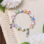 Pulsera de Una Decena de Cuentas de Cerámica de Colores con Santo Cáliz