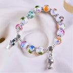 Pulsera de Una Decena de Cuentas de Cerámica de Colores con Santo Cáliz