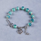 Pulsera de Cuentas de Cerámica Verde con Rosa y Crucifijo "Floración Alegre"