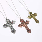Collar con Dije Crucifijo Ornamentado con Iconografía de Todos los Santos y Gemas Rojas