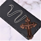 Collar con Dije Crucifijo Ornamentado con Iconografía de Todos los Santos y Gemas Rojas