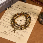 Pulsera Rosario Elástica Artesanal de Ojo de Tigre: Joya Espiritual de Doble Uso