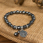 Pulsera Inspirada en Jerusalén de Piedra Negra Brillante: Símbolo de Fe