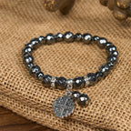 Pulsera Inspirada en Jerusalén de Piedra Negra Brillante: Símbolo de Fe
