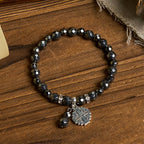 Pulsera Inspirada en Jerusalén de Piedra Negra Brillante: Símbolo de Fe