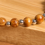 Pulsera de Rosa con Ícono de Jesús y Crucifijo: Joyería Espiritual Artesanal