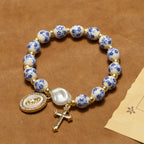 Pulsera de Inspiración Floral con Medalla de la Virgen y Cruz: Fe y Estilo