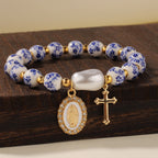 Pulsera de Inspiración Floral con Medalla de la Virgen y Cruz: Fe y Estilo