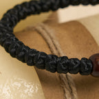 Pulsera de Cordón con Nudo de Cruz Azul y Negro: Señal de Fe
