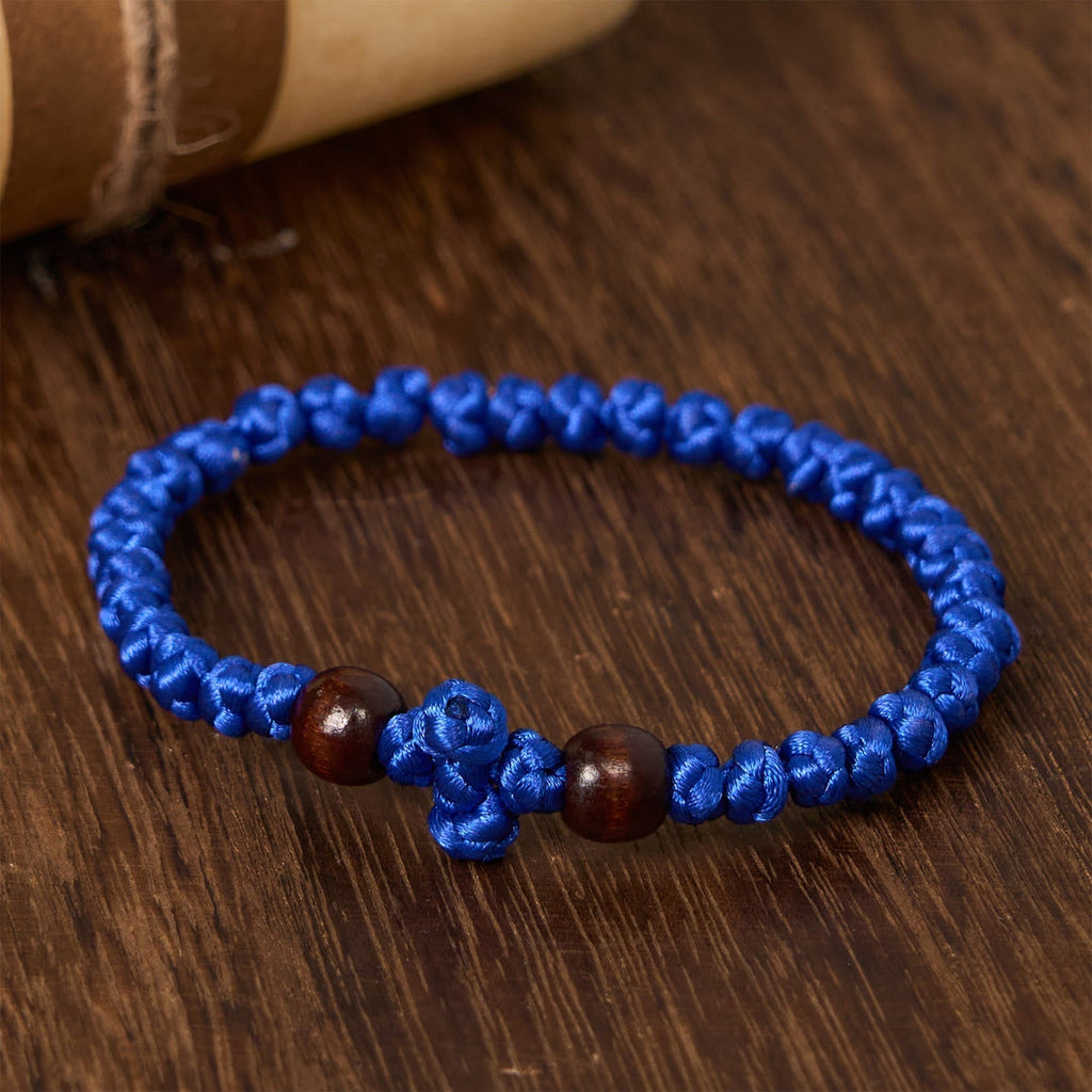 Pulsera de Cordón con Nudo de Cruz Azul y Negro: Señal de Fe