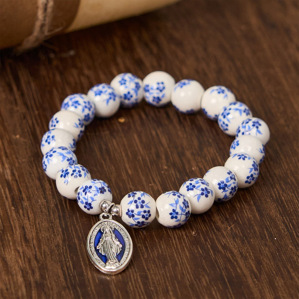 Pulsera Floral de Cuentas Azules y Blancas con Medalla Milagrosa