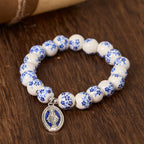 Pulsera Floral de Cuentas Azules y Blancas con Medalla Milagrosa