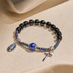 Pulsera de Ébano y Ágata Azul con Medalla de la Virgen y Crucifijo