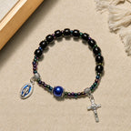 Pulsera de Ébano y Ágata Azul con Medalla de la Virgen y Crucifijo