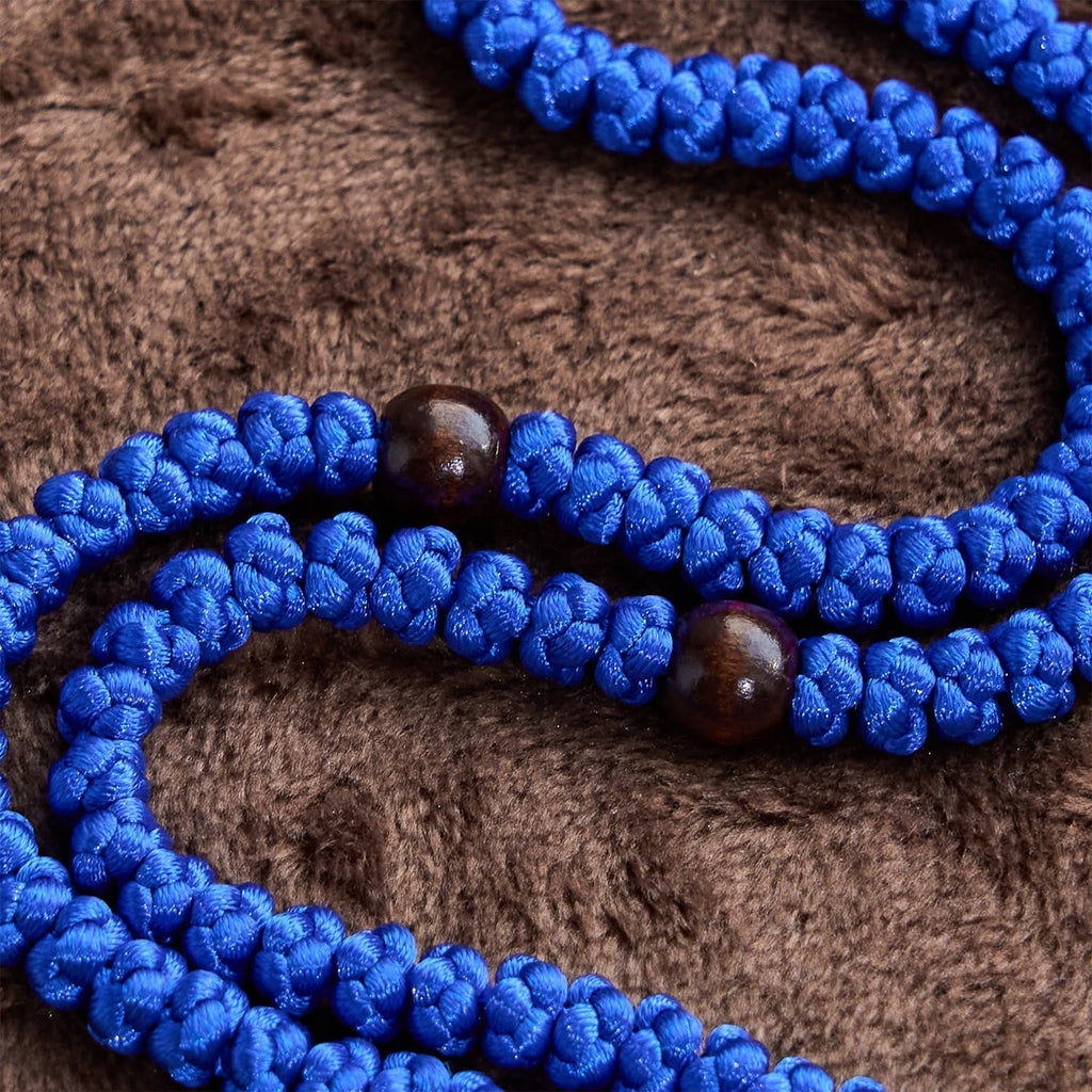 Collar de Cordón Azul y Negro con Cruz y 100 Nudos de Bendición: Símbolo de Bendición Santa