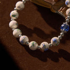 Pulsera Elástica de Cerámica Floral Multicolor con Medalla Milagrosa y Crucifijo