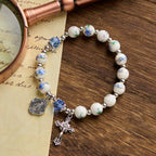 Pulsera Elástica de Cerámica Floral Multicolor con Medalla Milagrosa y Crucifijo