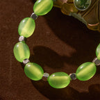 Pulsera de Rosa con Cuentas Verdes Transparentes con Dije de San Judas y Crucifijo