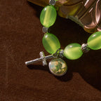 Pulsera de Rosa con Cuentas Verdes Transparentes con Dije de San Judas y Crucifijo