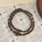 Pulsera Clásica de Cuentas de Madera con Cruz: Emblema Eterno de Fe Sobria