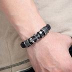 Pulsera Clásica de Cuero Trenzado con Santa Cruz en Dos Tonos