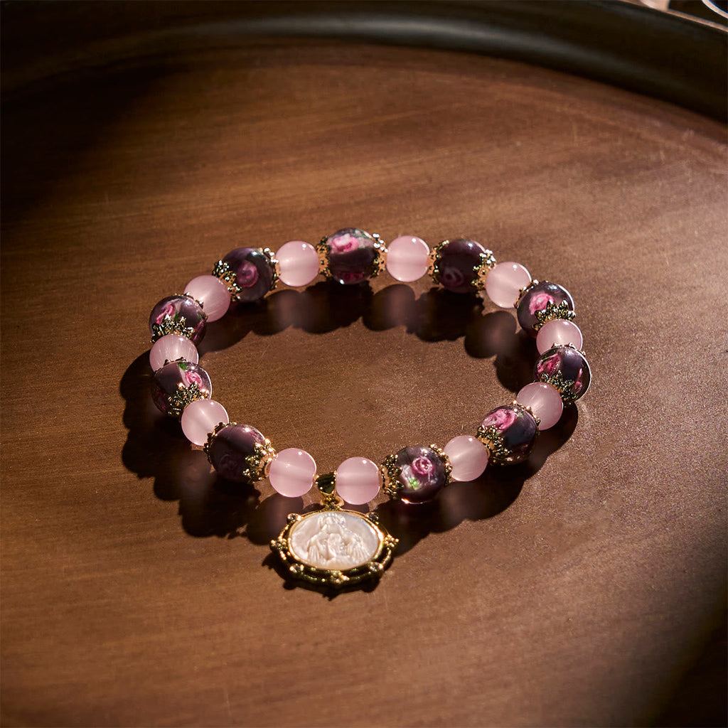 Pulsera Artesanal de Cristal de Cuarzo Rosa con Camafeo de la Virgen María