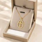 Elegant Oval Cross Necklace with Crystal Halo