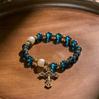 Pulseras Espirituales de Cuentas Azules Brillantes con Crucifijo Sagrado de Latón