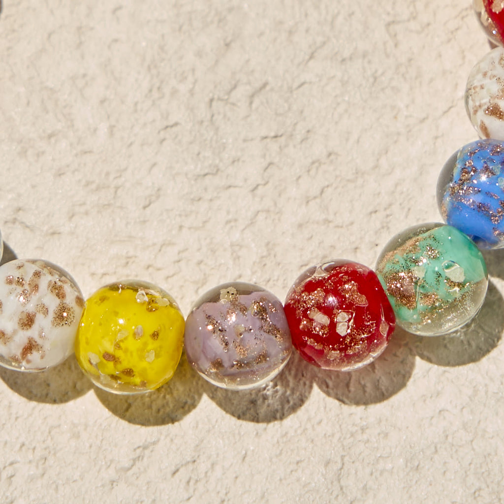 Pulseras de Cristal con Motas Doradas que Brillan en la Oscuridad con Crucifijo
