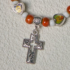 Pulseras de Cuentas de Cristal y Cerámica de Colores con Cruz y Dijes de Santos