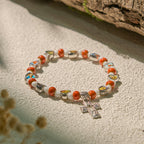 Pulseras de Cuentas de Cristal y Cerámica de Colores con Cruz y Dijes de Santos