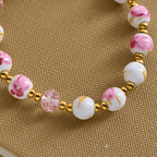Pulsera Elegante de Cerámica Rosa de 8 mm con Patrón Floral y Medalla Milagrosa