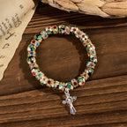 Pulsera de Fe Eterna con Cuentas Artesanales de Cloisonné: Testimonio de la Presencia de Cristo
