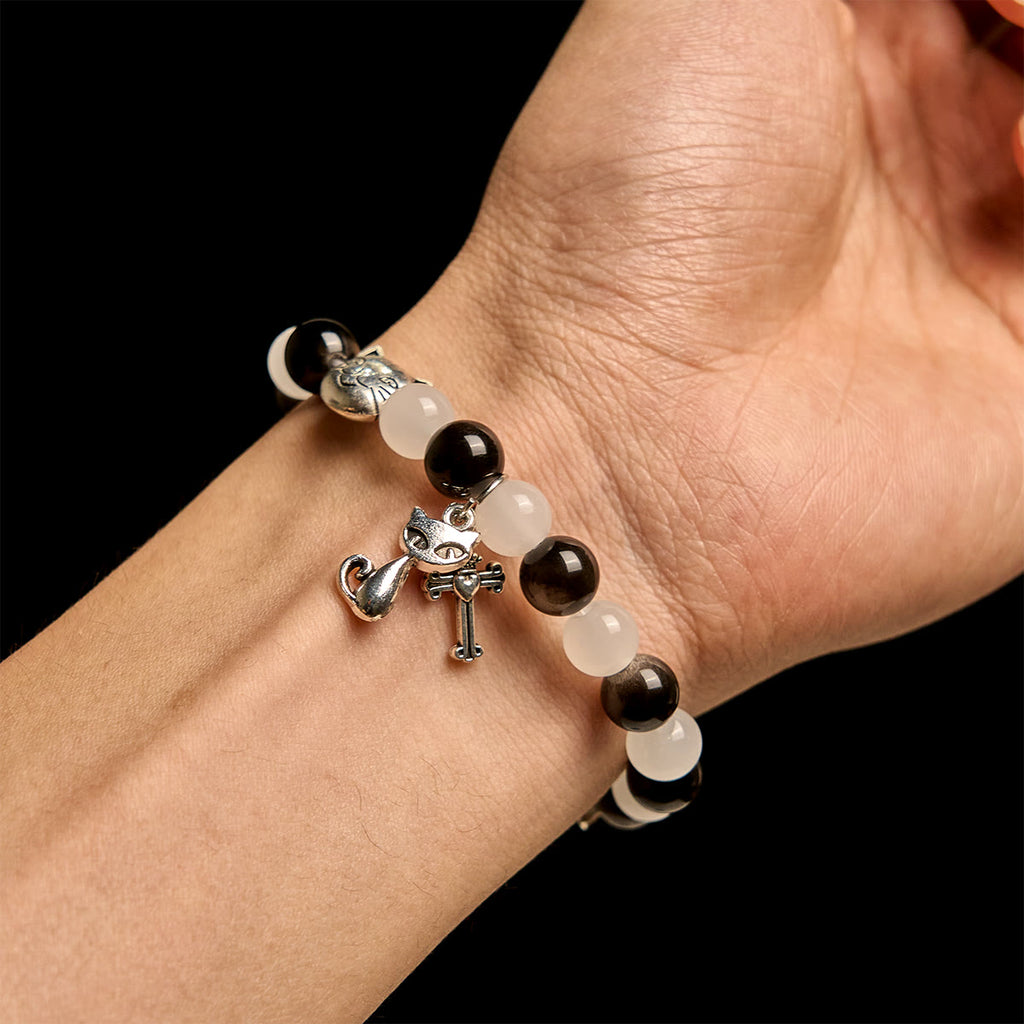 Pulsera Animal de Cuentas con Gata Blanca y Negra "Bendición de la Virgen"