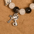 Pulsera de Cuentas con Gata Blanca y Negra "Bendición de la Virgen", Rosario Animal