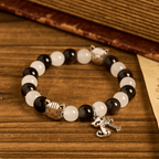 Pulsera Animal de Cuentas con Gata Blanca y Negra "Bendición de la Virgen"