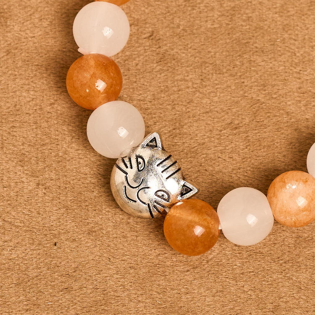 Pulsera Animal de Cuarzo Naranja y Blanco con Dijes de Gato Atigrado en Acero