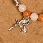 Pulsera Animal de Cuarzo Naranja y Blanco con Dijes de Gato Atigrado en Acero