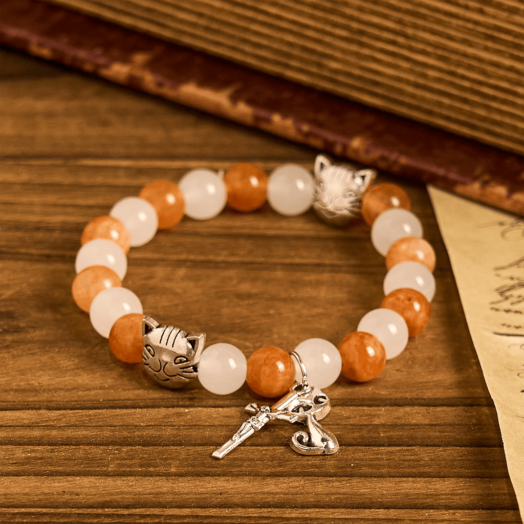 Pulsera de Cuarzo Naranja y Blanco con Dijes de Gato Atigrado en Acero, Rosario Animal
