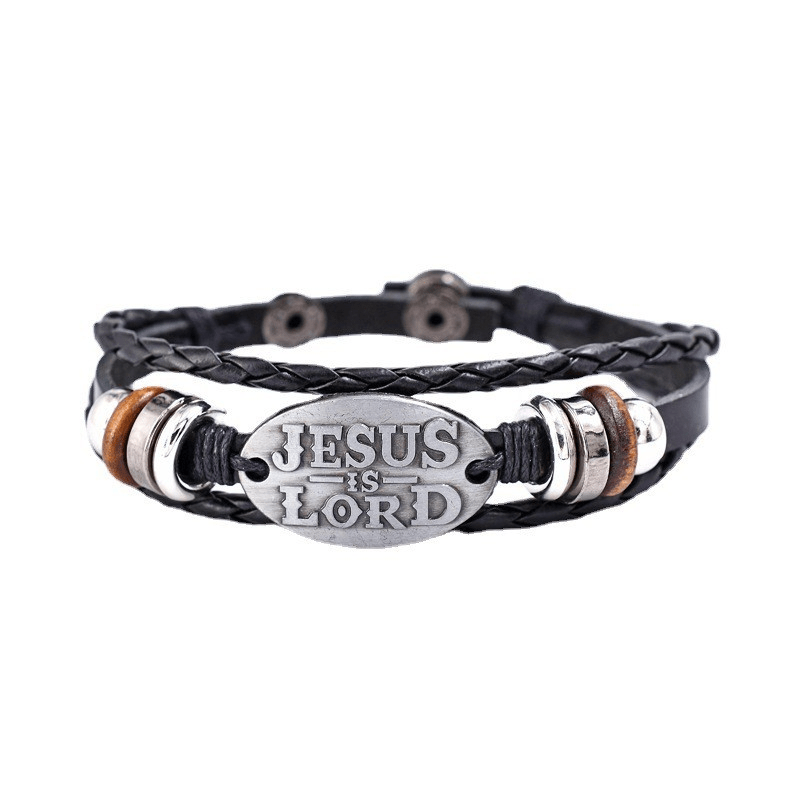 Pulsera de Cuero Trenzado Negro con Inscripción "JESÚS ES EL SEÑOR"
