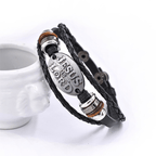 Pulsera de Cuero Trenzado Negro con Inscripción "JESÚS ES EL SEÑOR"