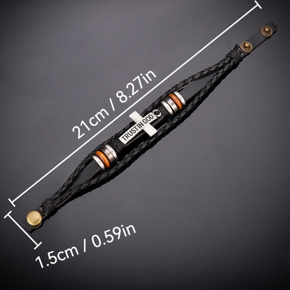 Pulsera de Cuero Trenzado Negro con Cruz e Inscripción "CONFÍA EN DIOS"