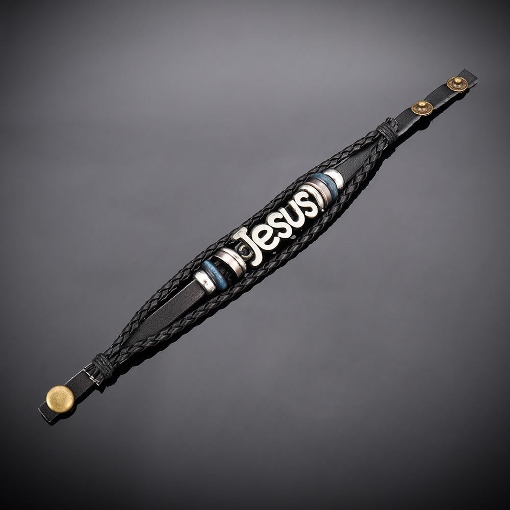Pulsera de Cuero Trenzado Negro con Dije de Jesús en Dos Tonos