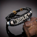 Pulsera de Cuero Trenzado Negro con Dije de Jesús en Dos Tonos