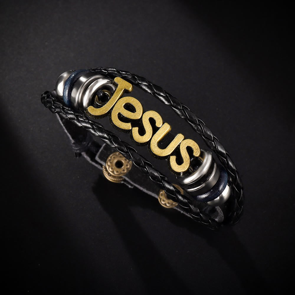 Pulsera de Cuero Trenzado Negro con Dije de Jesús en Dos Tonos